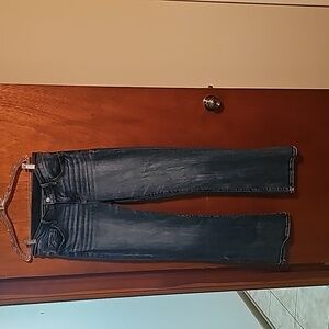 Women's Buckle Black Bootcut jeans. Size 29x32.